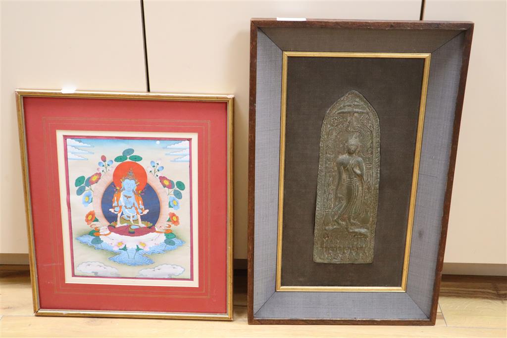 A Thai bronze votive plaque and a Tibetan thangka painting